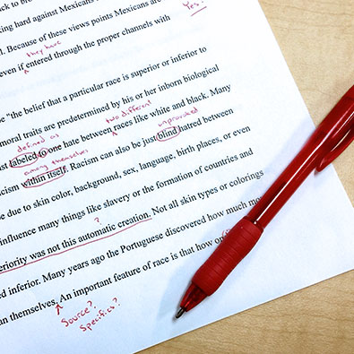 Red pen corrections on a written document
